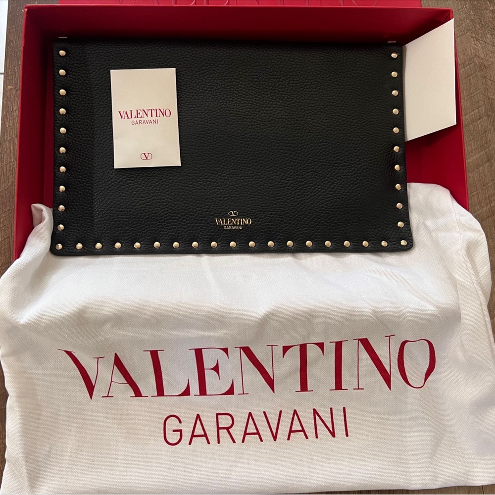 Valentino clutch, new with box and certificates.
